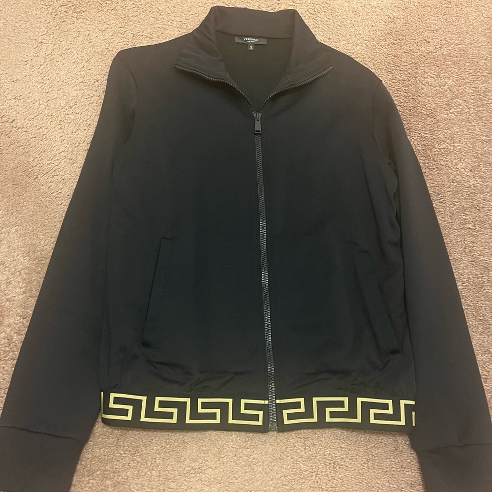 Versace track jacket with full zip front with brands signature Greca print